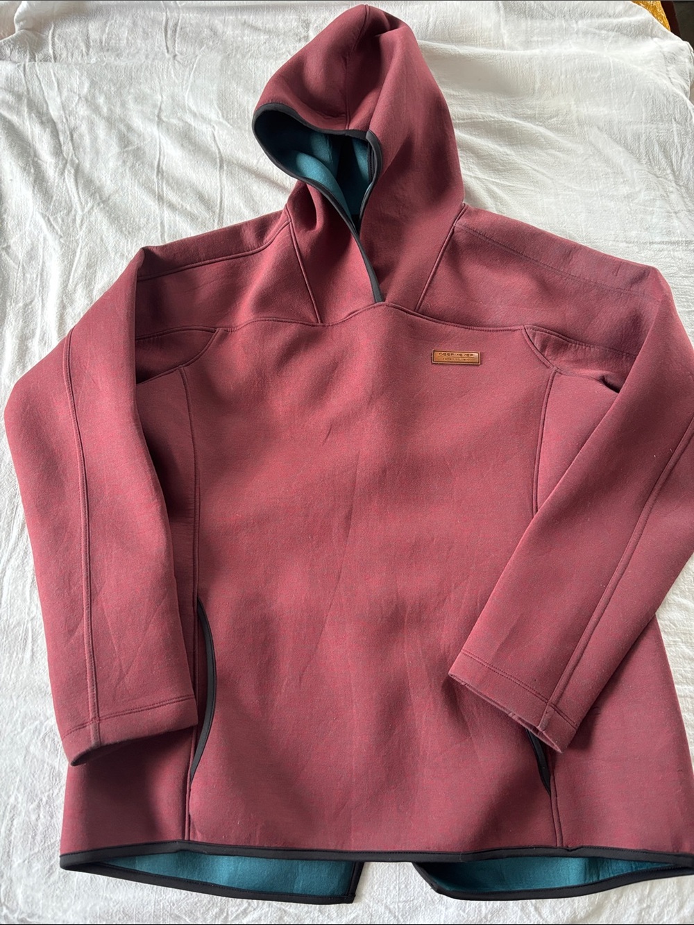 Obermeyer hoodie, red w/teal lining, black piping,pockets, back vent, size S?